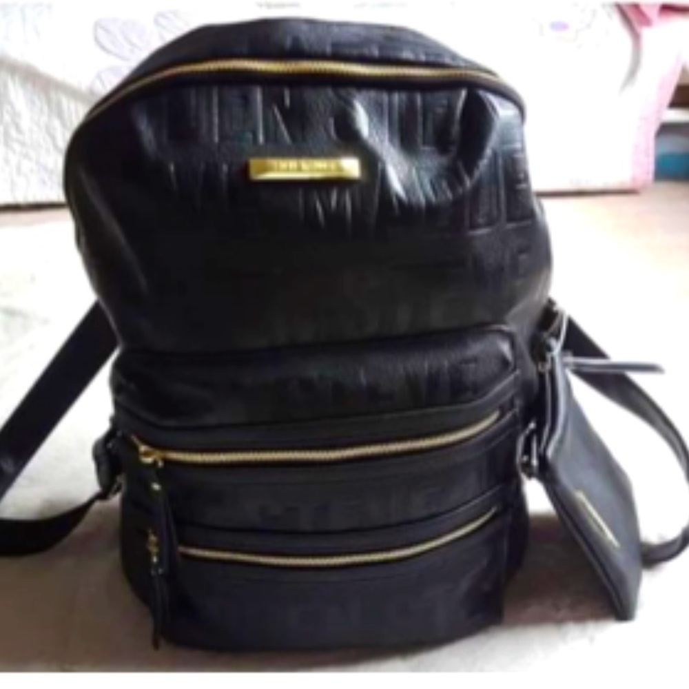 Steve Madden leather backpack with little handbag